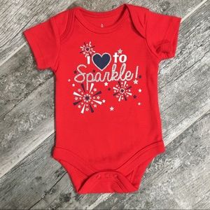 Newborn girl’s patriotic onesie